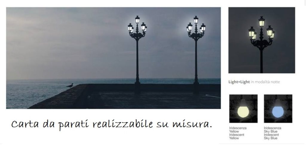 Carta da parati che s'illumina di notte con mare al tramonto